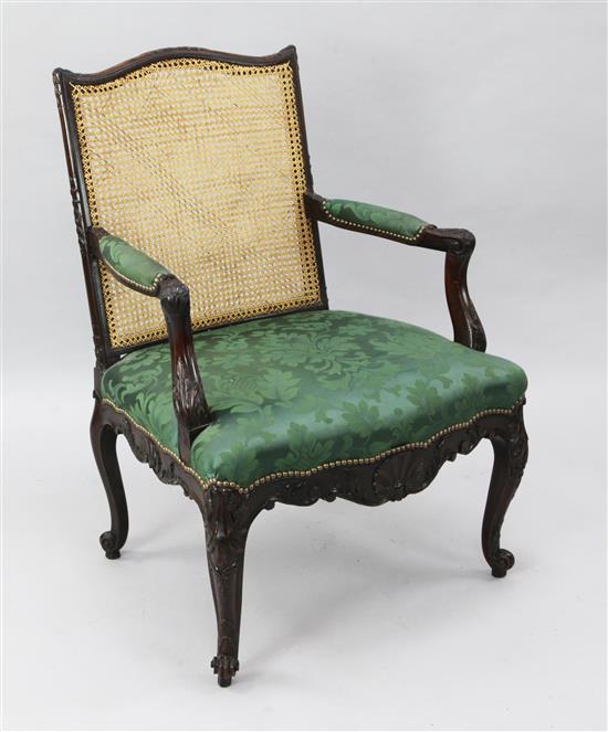 A George III mahogany Gainsborough chair, W.2ft 2in. D.2ft H.3ft